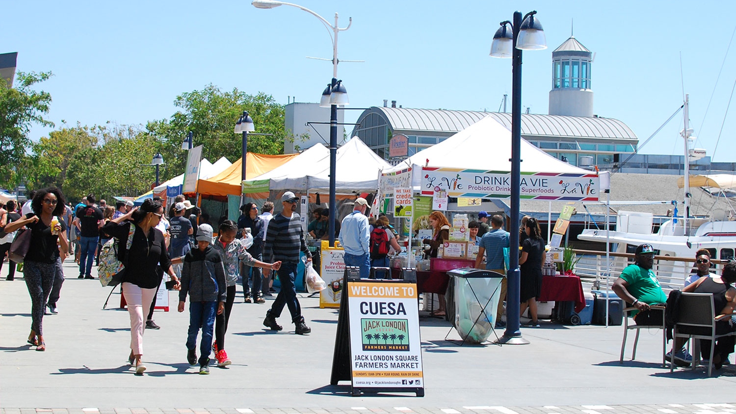 While picking up your berries and veggies at the Jack London Square Farmers Market, you might catch a cooking demo or a food tasting or even a fun activity for the kids. Photo courtesy of CUESA.