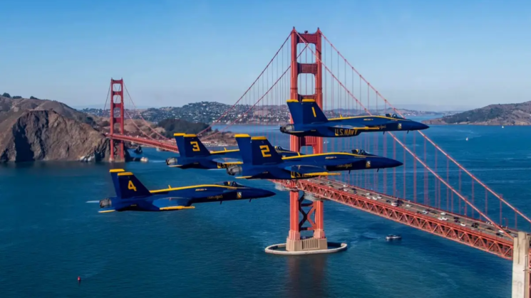 army planes fly in the sky with the golden gate bridge in the back drop