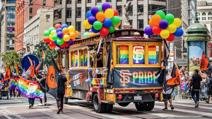 A cable car passing the crowd at the San Francisco Pride Parade. Photo courtesy of CrawlSF.