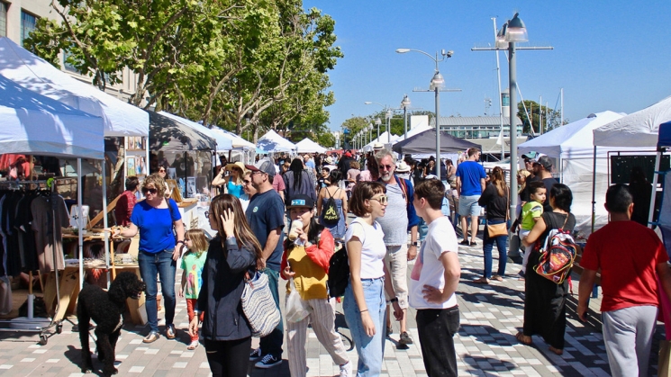 People at the Patchwork Show, Makers Market & Community Festival. 
