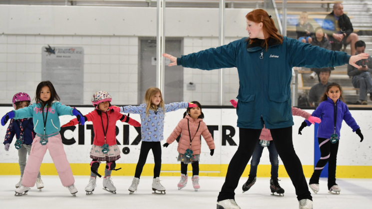 Kids learning to ice skate at Oakland Ice Center