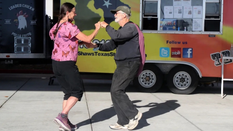 Two people dancing at the El Cerrito WorldOne Festival. Photo courtesy of East Bay Times. 