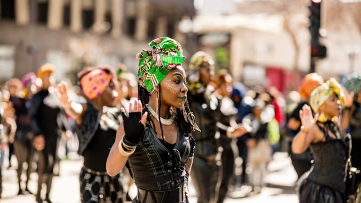 Dancer in regalia at Black Joy Parade, courtesy of organization via Bustle. 