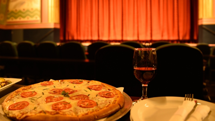 Pizza and a glass of wine at Rialto Cinemas Cerrito. Photo courtesy of Rialto Cinemas Cerrito.