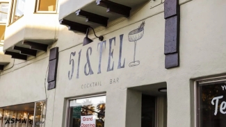 Stop by for 51 & Tel for a friendly atmosphere, local art and cocktails on the patio. Photo courtesy of Eater.