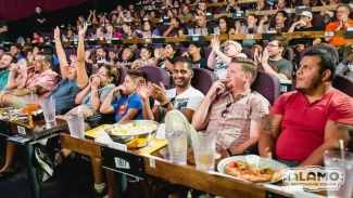 Date nights don't get much better than scary movies and comfort food. Photo courtesy of Alamo Drafthouse via Yelp.
