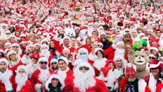 Join thousands of Santas this year at San Francisco's lively Santacon. Photo courtesy of DoTheBay. 
