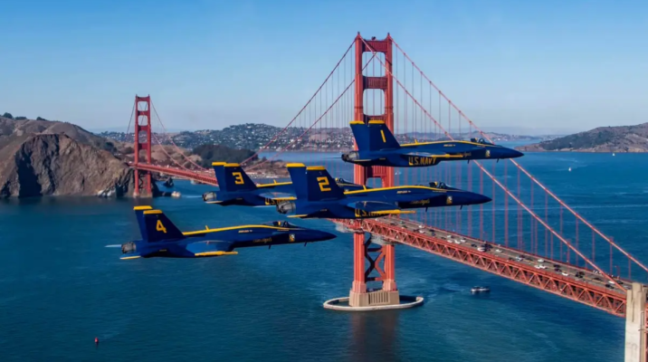 army planes fly in the sky with the golden gate bridge in the back drop