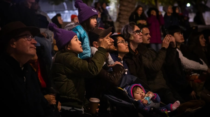People watching Lets Glow SF
