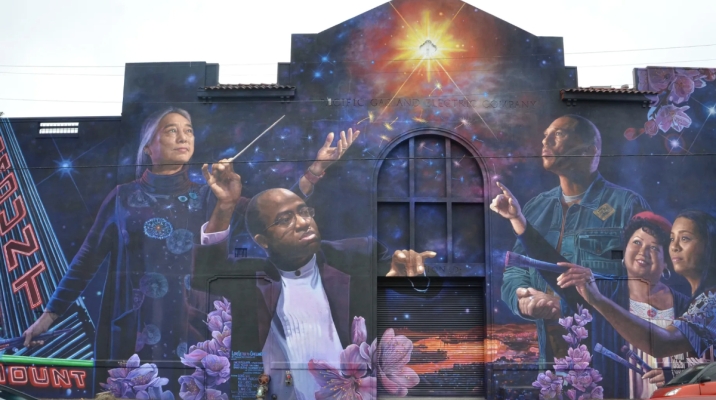 love letter to oakland mural featuring mixed age, gender and ethnic people reading for a start